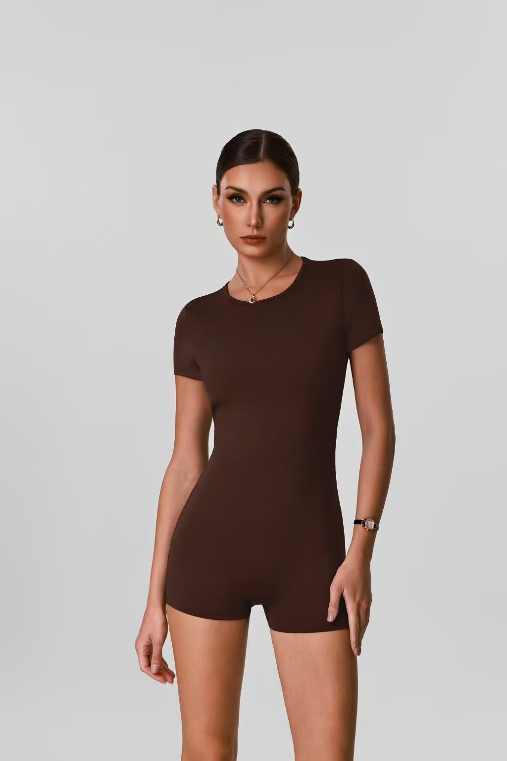 Brown short sleeve activewear romper sample
