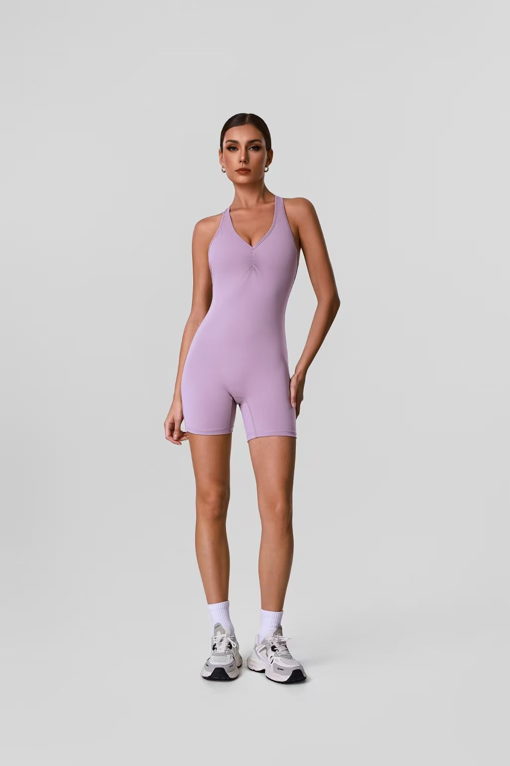 Lilac one-piece activewear romper sample
