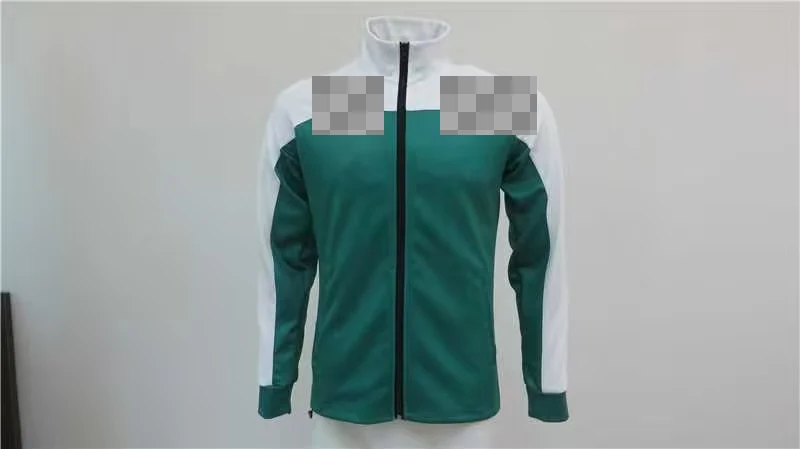 A two-tone zip-front jacket; chest identifiers are obscured.